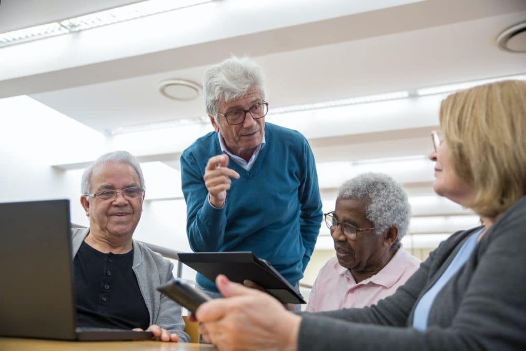 Seniors discussing how to change from a Medicare Advantage to a Medigap plan.